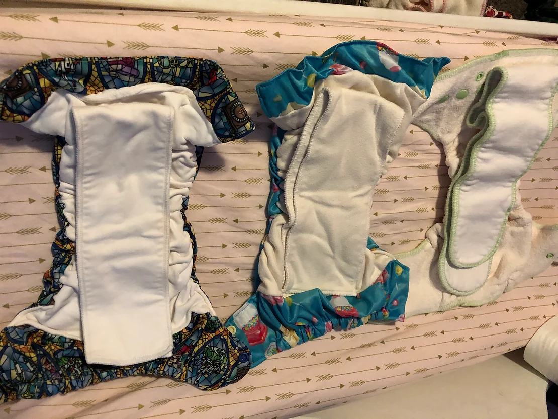 inside view of three cloth diapers